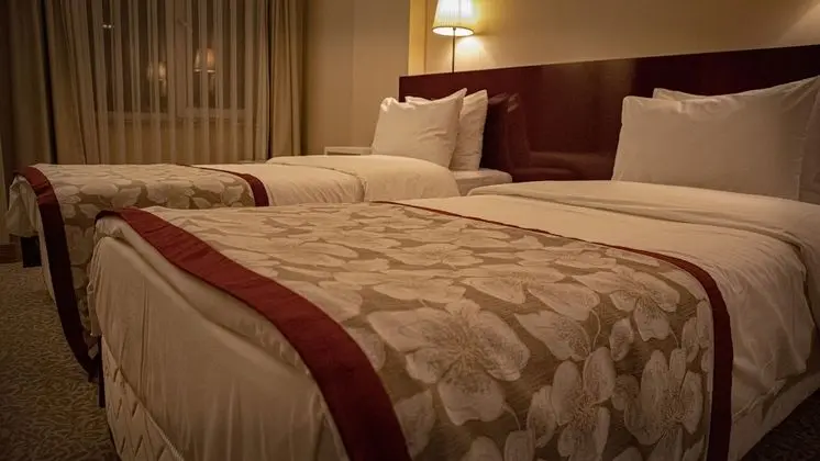 Deluxe Tek Büyük veya İki Ayrı Yataklı Oda