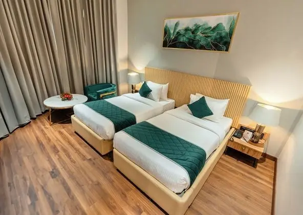 Deluxe Tek Büyük veya İki Ayrı Yataklı Oda
