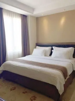 Deluxe Tek Büyük veya İki Ayrı Yataklı Oda