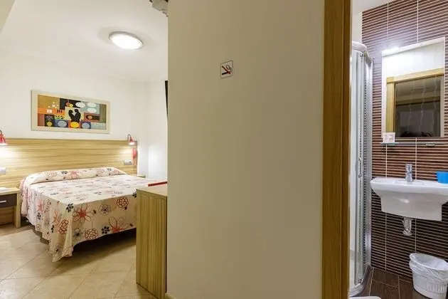 Basic Tek Büyük veya İki Ayrı Yataklı Oda