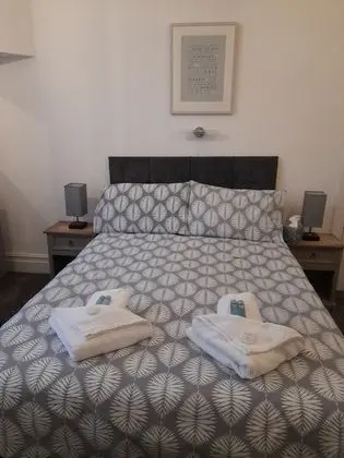 Tek Büyük veya İki Ayrı Yataklı Oda (En-Suite)