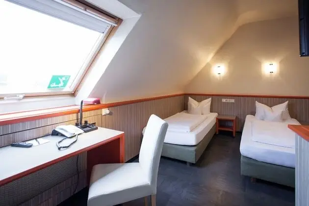 Doppel -oder-Zweibettzimmer