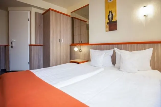 Doppel -oder-Zweibettzimmer