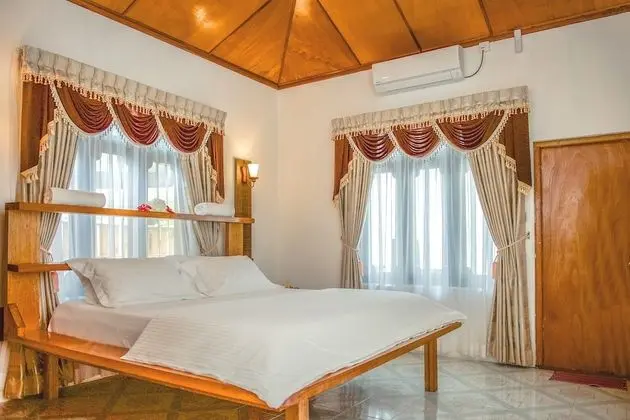 Deluxe Tek Büyük veya İki Ayrı Yataklı Oda