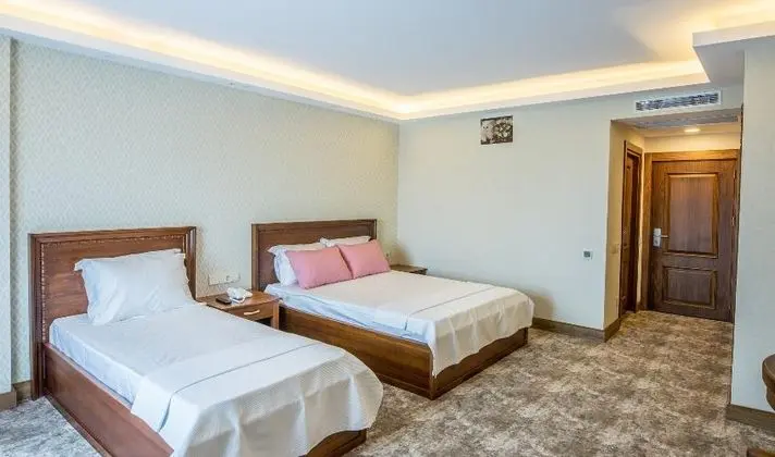 Üç Kişilik Oda