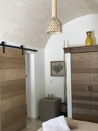 Deluxe Tek Büyük veya İki Ayrı Yataklı Oda (Trulli Pignon)