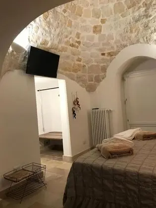 Deluxe Tek Büyük veya İki Ayrı Yataklı Oda (Trulli Pignon)