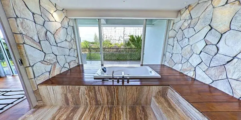 TStone Jacuzzi Suite Standard Check Out at 2:00 PM
