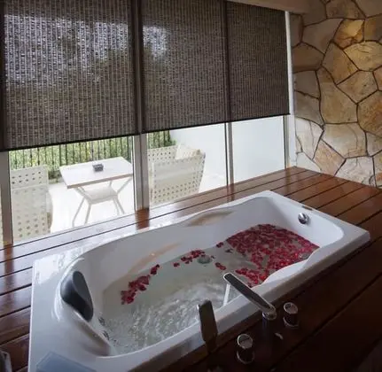TStone Jacuzzi Suite Standard Check Out at 2:00 PM
