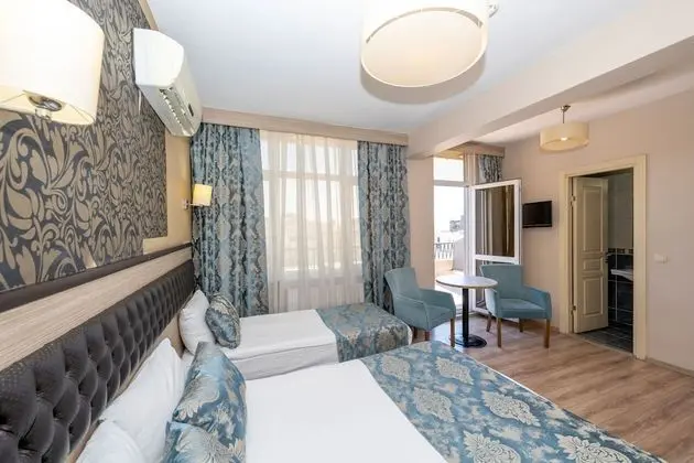 Deluxe Triple Room