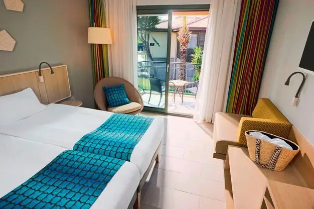 https://images.etstur.com/imgproxy/resize/2560x1440/files/images/hotelImages/etsrooms/630/TUI_BLUE_Palm_Garden_20251031115348_4.jpg