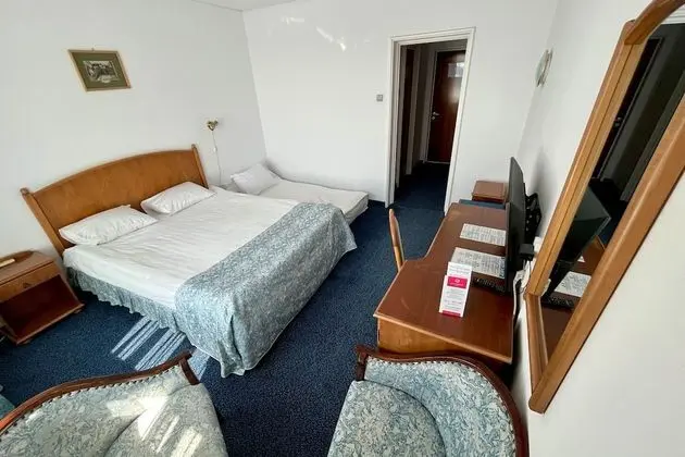 Standard Double Room with extendable armchair