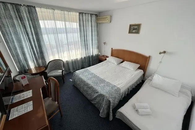 Standard Double Room with extendable armchair