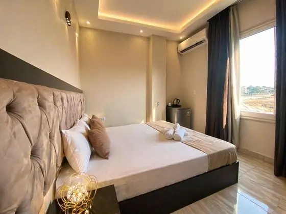 Deluxe Tek Büyük veya İki Ayrı Yataklı Oda
