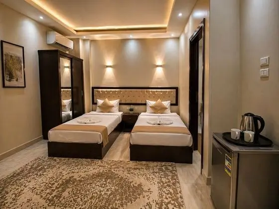 Deluxe Tek Büyük veya İki Ayrı Yataklı Oda