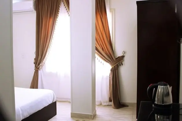 Deluxe Tek Büyük veya İki Ayrı Yataklı Oda