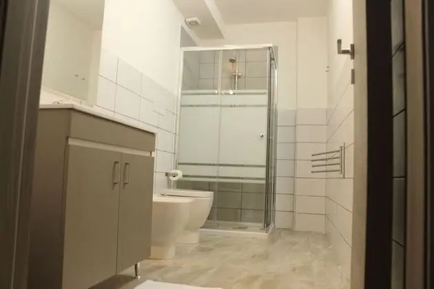 Üç Kişilik Oda