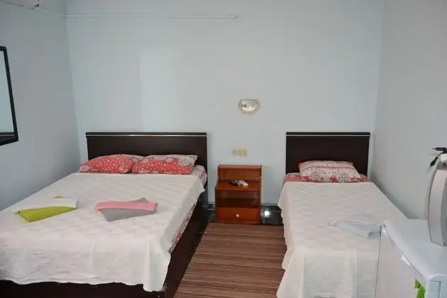 Üç Kişilik Oda