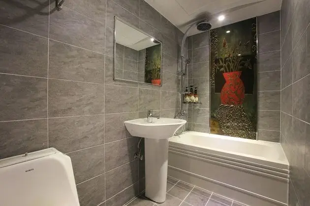 Oda (Deluxe rooms (Netflix YouTube availab)