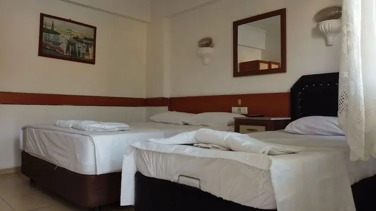 Üç Kişilik Oda