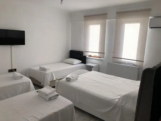 204 6 kişilik oda 1 çift yatak 4 tekli