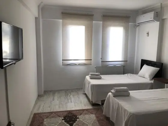 204 6 kişilik oda 1 çift yatak 4 tekli