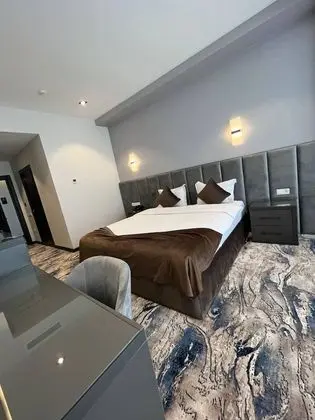 Deluxe Tek Büyük veya İki Ayrı Yataklı Oda
