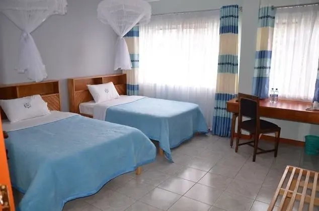 Deluxe Tek Büyük veya İki Ayrı Yataklı Oda