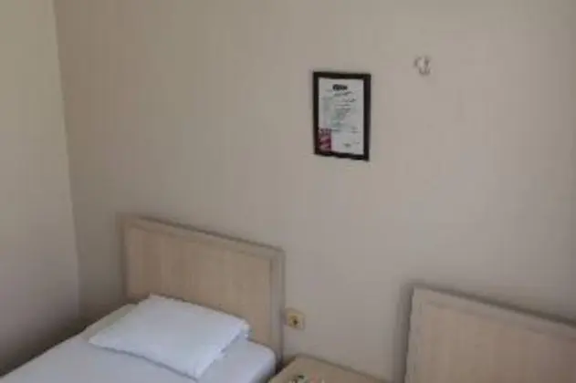 Üçlü