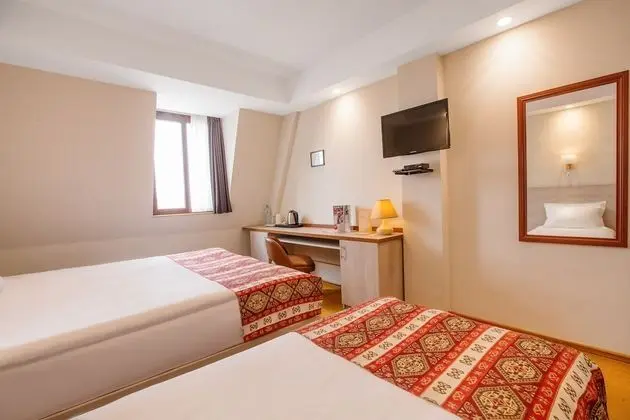 Economy Üç Kişilik Oda