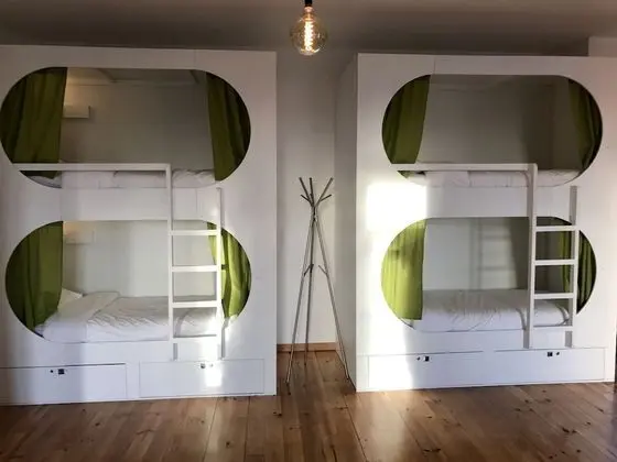 Private sleeping pod in 12 people dormitory