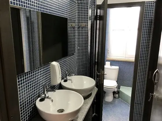 Private sleeping pod in 12 people dormitory