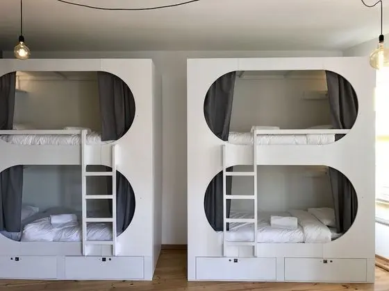 Private sleeping pod in 8 people dormitory