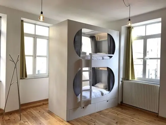 Private sleeping pod in 8 people dormitory (with Garden View)