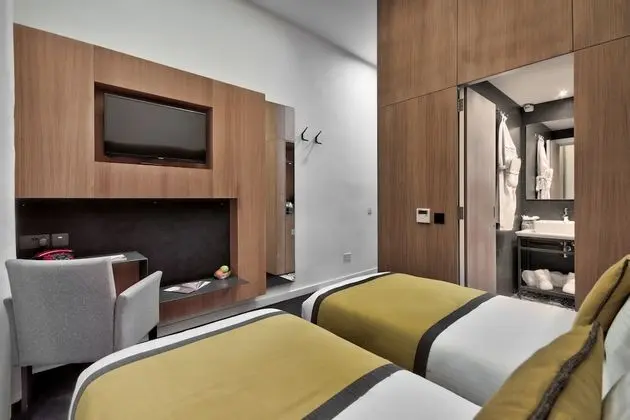 Deluxe Tek Büyük veya İki Ayrı Yataklı Oda