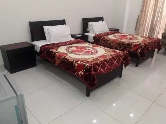 Deluxe Tek Büyük veya İki Ayrı Yataklı Oda