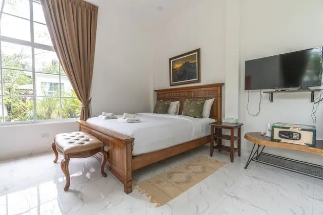 Deluxe Tek Büyük veya İki Ayrı Yataklı Oda