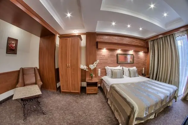 Deluxe Tek Büyük veya İki Ayrı Yataklı Oda