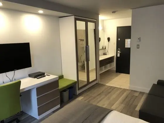 Chambre Executive , 1 lit Queen 1 lit escamotable