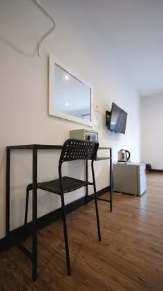 Standard Üç Kişilik Oda, Havuz Manzaralı