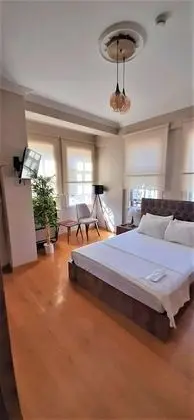 Üç Kişilik Oda