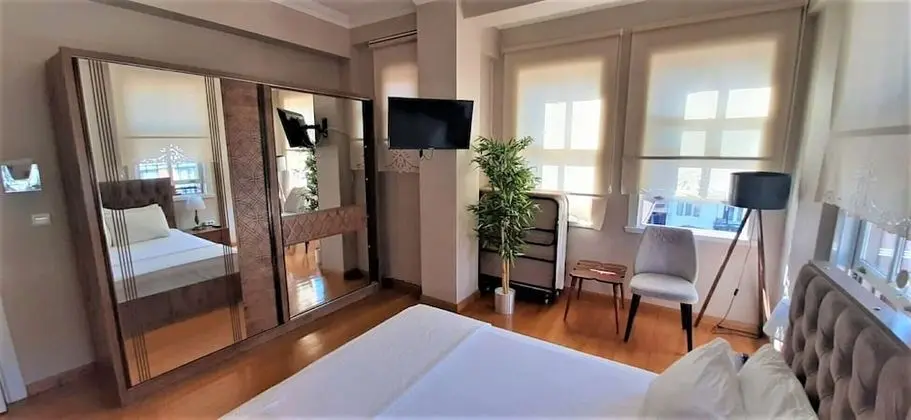 Üç Kişilik Oda