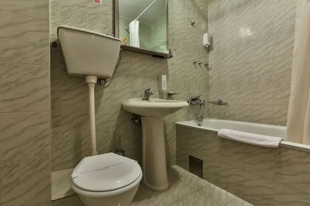 Classic Tek Büyük veya İki Ayrı Yataklı Oda