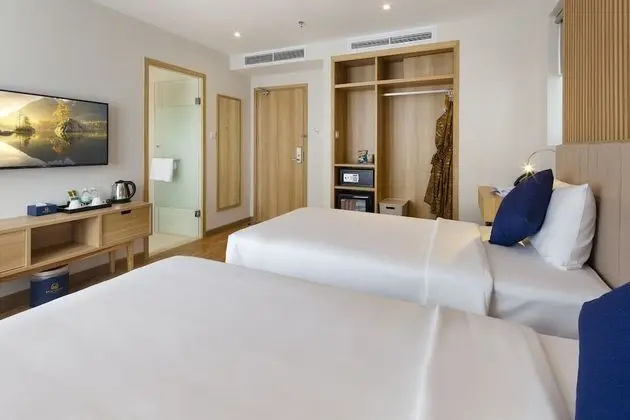 Deluxe Tek Büyük veya İki Ayrı Yataklı Oda