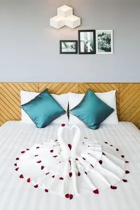 Deluxe Üç Kişilik Oda, Kısmi Deniz Manzarası