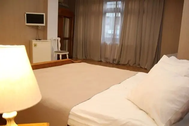 City Tek Büyük Yataklı Oda