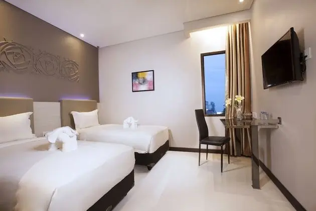 Deluxe Tek Büyük veya İki Ayrı Yataklı Oda