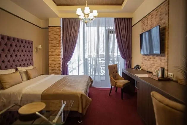 Deluxe Tek Büyük veya İki Ayrı Yataklı Oda
