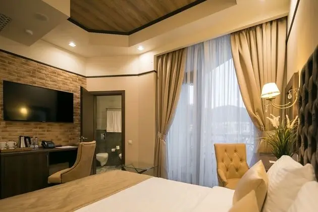Deluxe Tek Büyük veya İki Ayrı Yataklı Oda