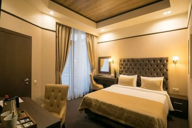 Deluxe Tek Büyük veya İki Ayrı Yataklı Oda